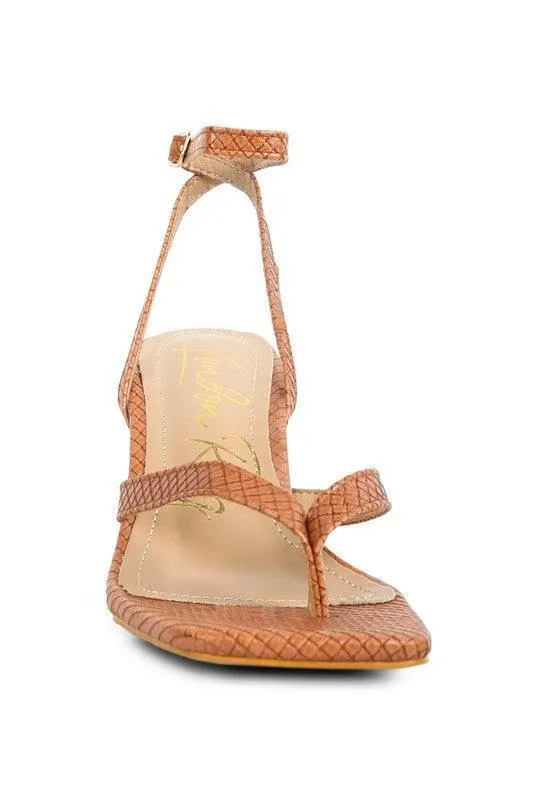 CELTY Ankle Strap Spool Heel Thong Sandals by VYSN