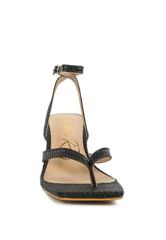 CELTY Ankle Strap Spool Heel Thong Sandals by VYSN