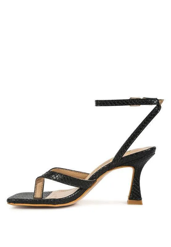 CELTY Ankle Strap Spool Heel Thong Sandals by VYSN