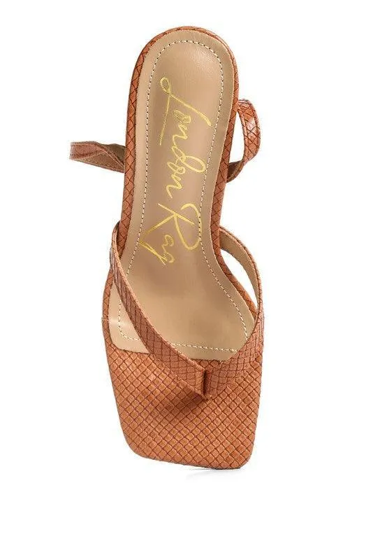 CELTY Ankle Strap Spool Heel Thong Sandals by VYSN