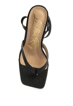 CELTY Ankle Strap Spool Heel Thong Sandals by VYSN