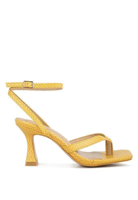 CELTY Ankle Strap Spool Heel Thong Sandals by VYSN